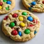 Baking easy M&M cookies with colorful candy pieces