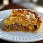 Delicious cheeseburger pie served hot with melted cheese and toppings.