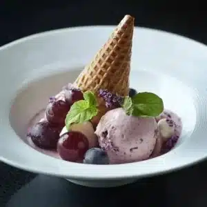 The Ultimate Grape Ice Cream Recipe You'll Absolutely Love 4 Delicious homemade grape ice cream in a bowl with fresh grapes