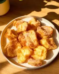 Fried Milk: Crispy Spanish Custard Recipe 5 Plate of crispy Fried Milk, a traditional Spanish custard dessert.