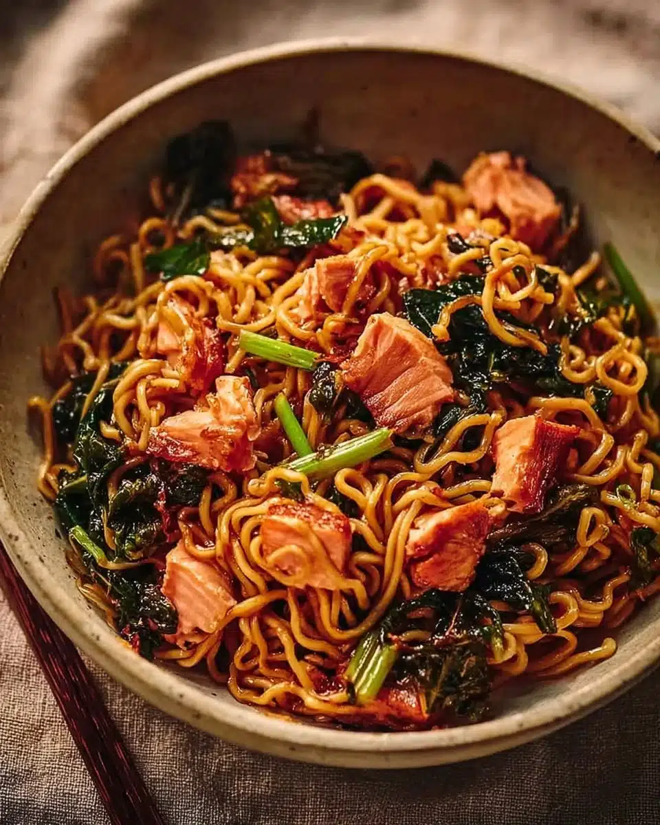 Delicious teriyaki salmon served over a bed of savory noodles.