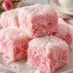 Old-Fashioned Australian Pink Coconut Cakes with a pink coconut frosting